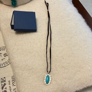 Sterling silver and turquoise Oval Pendant Necklace with Scalloped Setting.